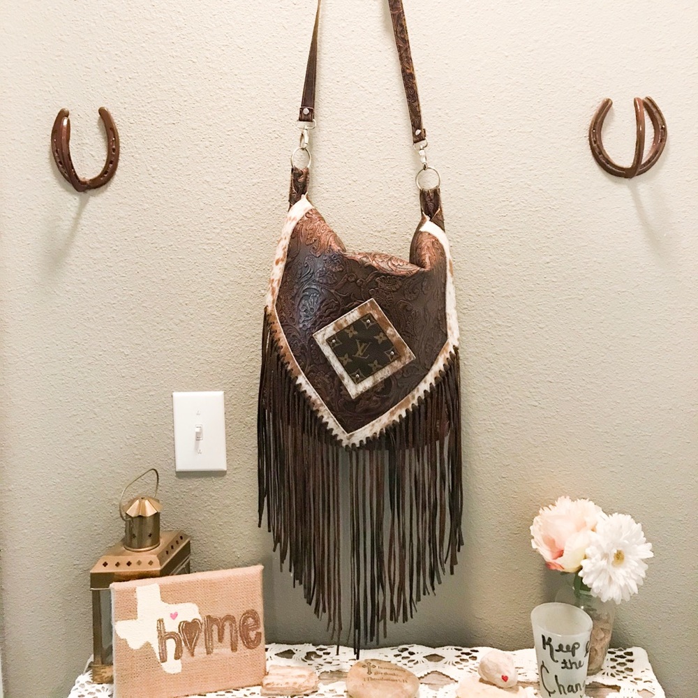 Leather purse with LV and cowhide accents